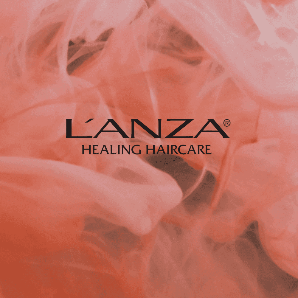 L’ANZA Healing Haircare logo on a pink smoky background.